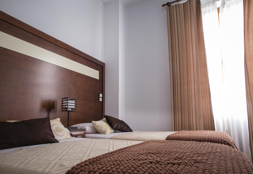 Apartamentos Casa De La Lonja Гранада Стая снимка