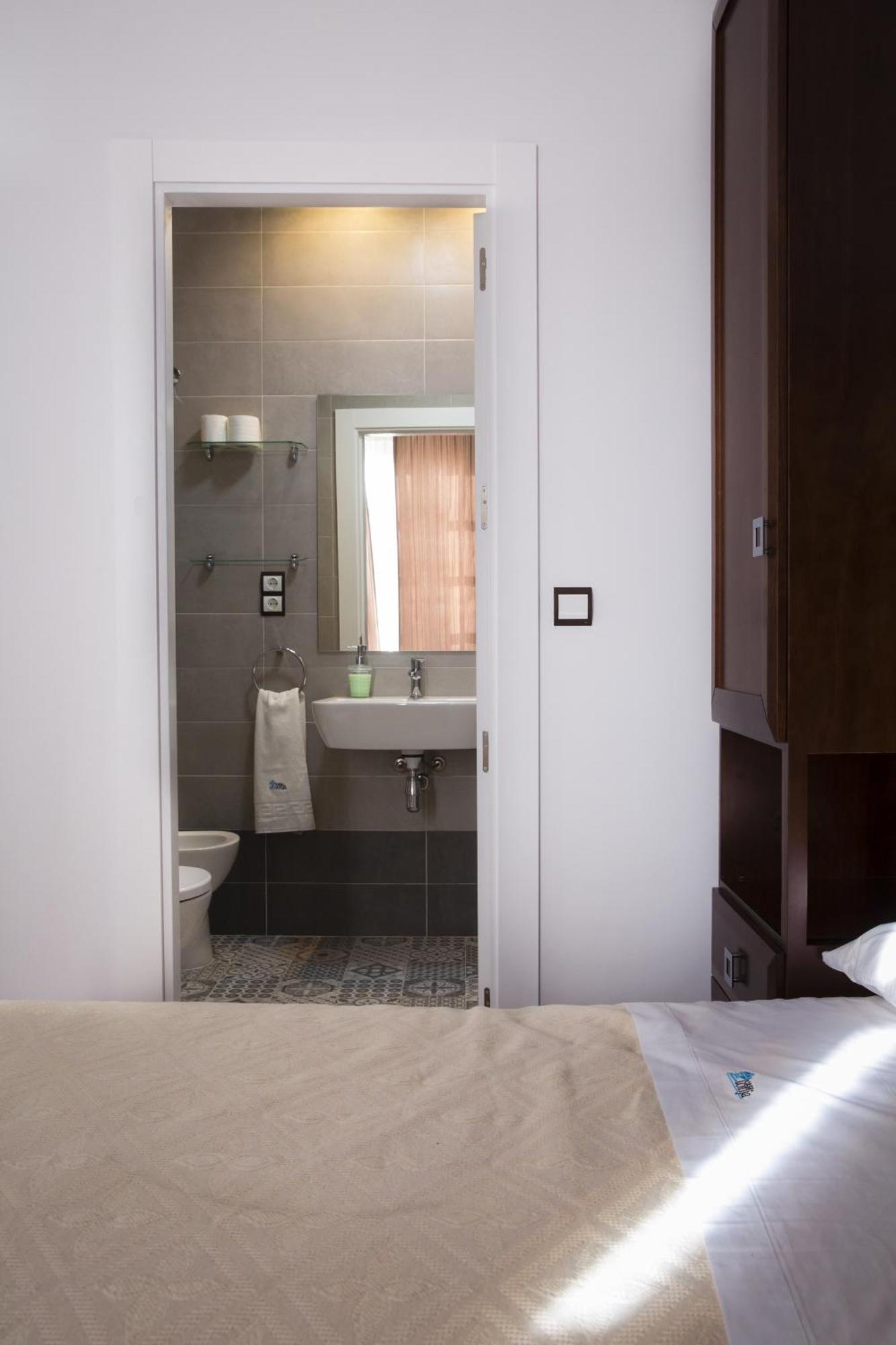 Apartamentos Casa De La Lonja Гранада Стая снимка