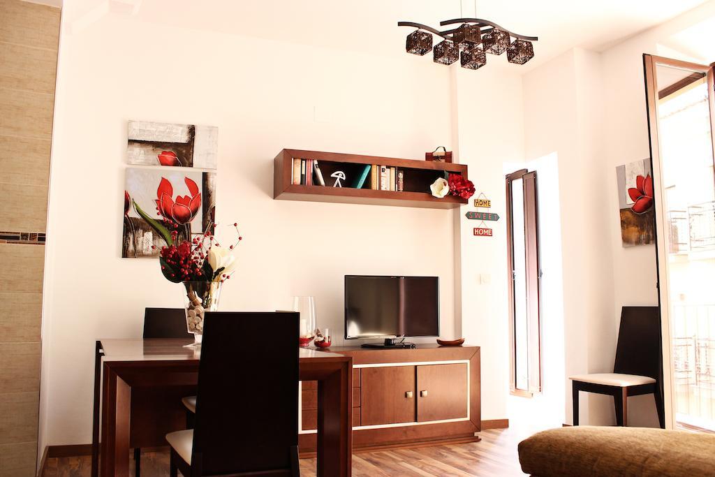 Apartamentos Casa De La Lonja Гранада Стая снимка
